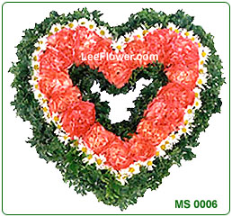 ( MS 0006 )  Love You,  Mom.  Pink Carnation arrange in a Heart shape with greenery. 