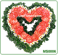 ( MS 0006 )  Love You,  Mom.  Pink Carnation arrange in a Heart shape with greenery. 