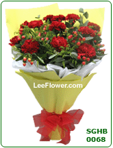 ( SGHB 0068 ) Abundant Love for Mom. 12 Stalks of Red Carnation with yellow peacock special wrapping with crepe paper for hand bouquet.
